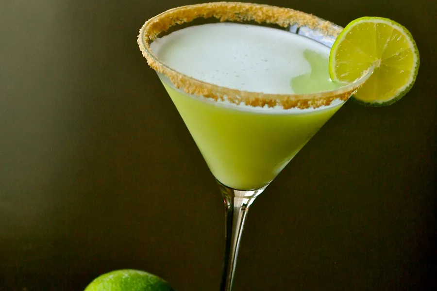 Key lime pie martini with a graham cracker rim